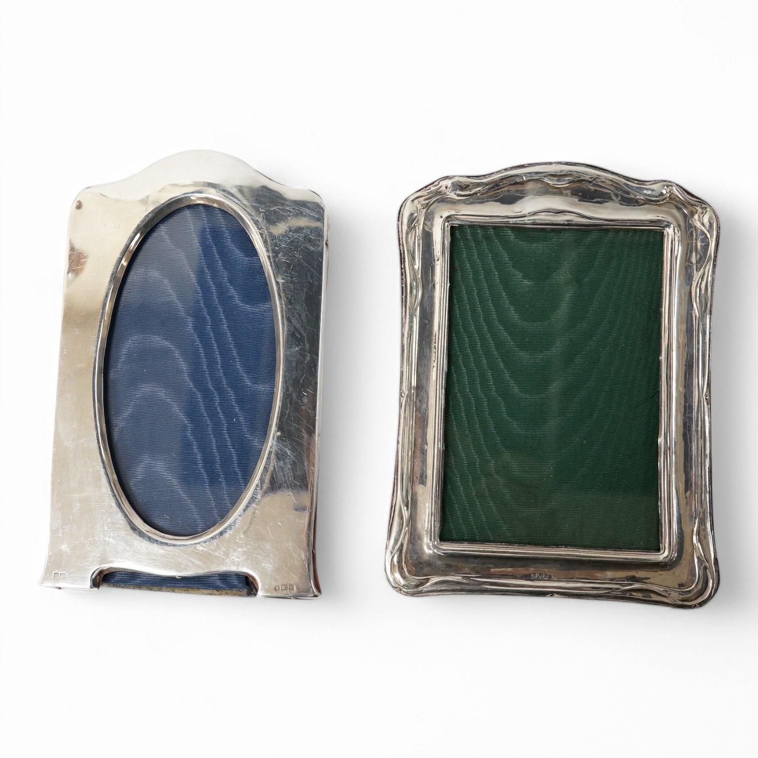 Two early 20th century silver mounted photograph frames, Chester, 1909 and Birmingham, 1917?, largest 19cm. Condition - poor to fair